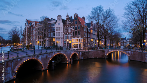Amsterdam Netherlands canals with lights during the evening in December during wintertime in the Netherlands Amsterdam city. Europe.