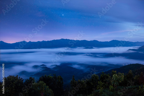 landscape and sky background concept, nature of north Thailand, fog-laden valleys, wintery mountain passes of Mae hong son province, top view on the mountain sunrise and sunset