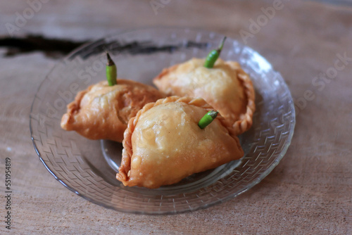 Kue Pastel or Jalangkote, Indonesian Traditional Snack with Diced Crrot and Potato Filling