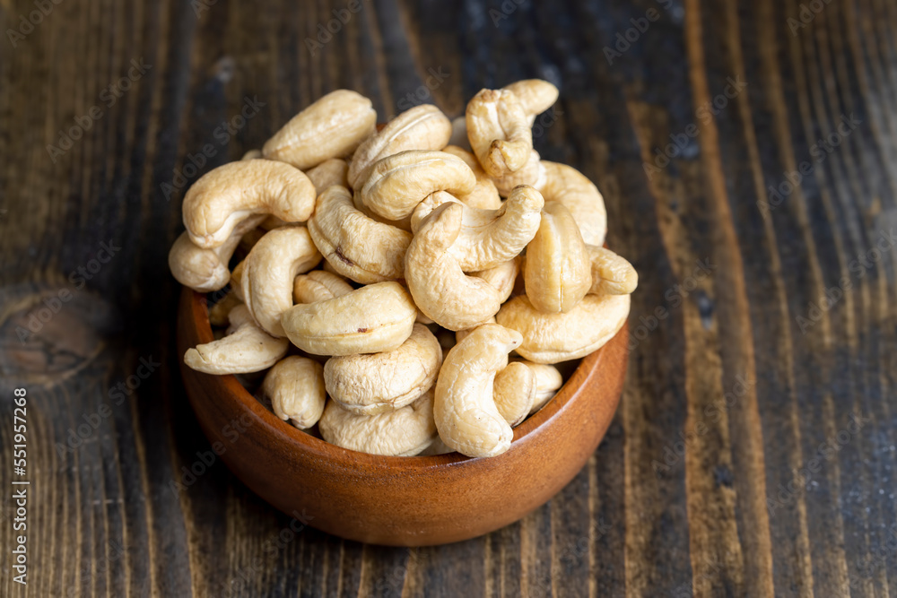 Fresh peeled cashew nuts on the table Fresh peeled cashew nuts on the table
