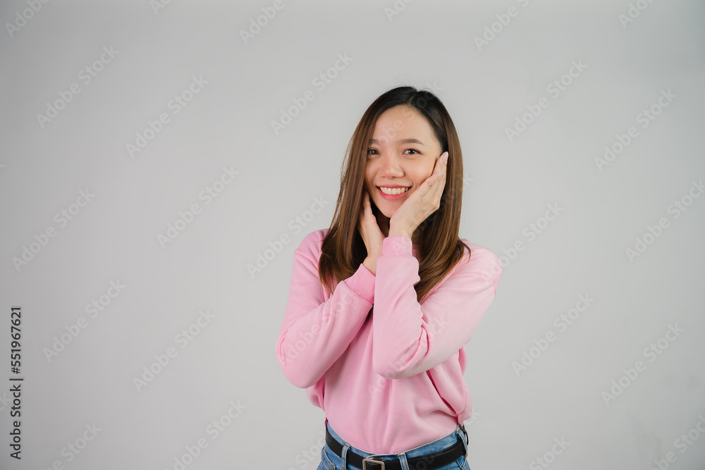 Asian girl holding laptop on white background Asian girl holding laptop on white background