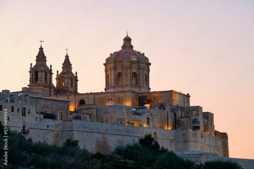 The gorgeous dome and two bell towers of St. Paul’s Cathedral on top of the fortified, medieval town - Mdina, Malta