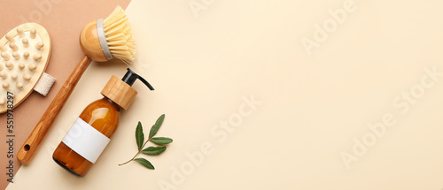 Wallpaper Mural Bottle of cosmetic product and anti-cellulite massage brushes on color background with space for text Torontodigital.ca