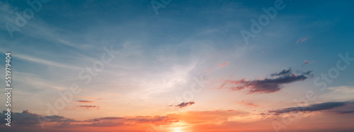 sunset sky with clouds background. © Hide_Studio