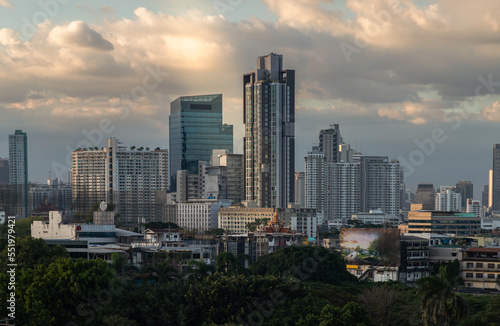 Beautiful view of Modern high-rise buildings in the evening time. Good time for waiting the sunset last light of the day, Nice city view, Selective Focus. © num