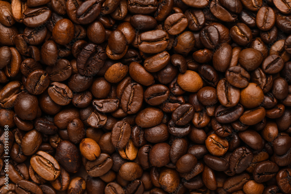 Closeup view of roasted coffee beans as background Closeup view of roasted coffee beans as background