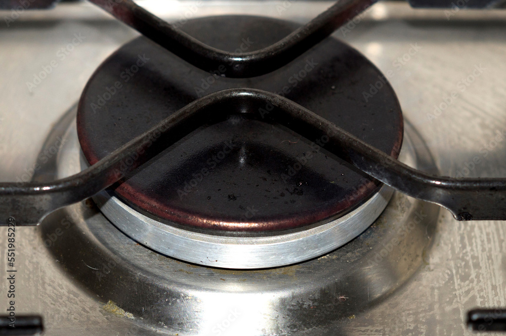 Gas burners of a household gas stove close-up Gas burners of a household gas stove close-up
