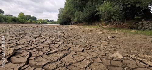 Adapting to Change: A Dried Riverbed Testament to Climate Impact on Nature's Balance