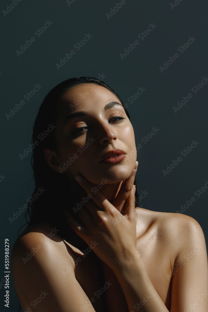 Fototapeta premium Sensual tunned beautiful woman on sun