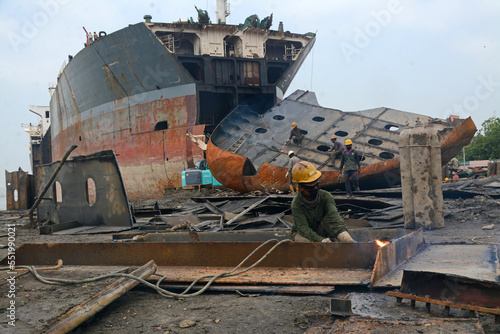 Inside of Ship breaking yard chittagong,Bangladesh.Workers at the ship breaking yard are busy cutting old ships.