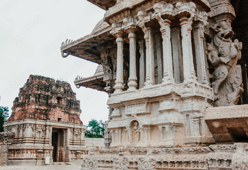 The Vittala Temple or Vitthala Temple in Hampi Pillars with entrance gate architecture . unesco world heritage site. 