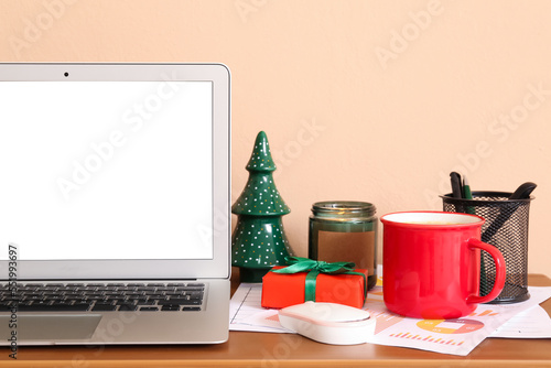 Laptop with Christmas gift ...