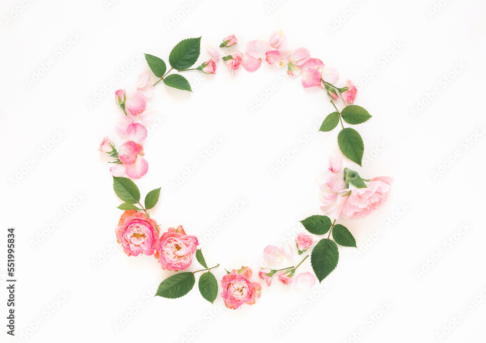 Minimalistic floral wreath on white background with copy space.