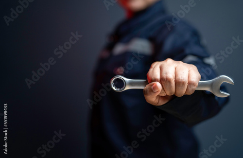 wrench repair work Industrial work, male handyman repairing tools, repairing, using building workers Auto repair industry with skilled wrench mechanics working professionally.