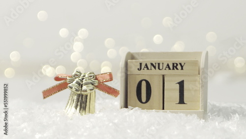 Golden merry christmas text with bokeh lights in the background