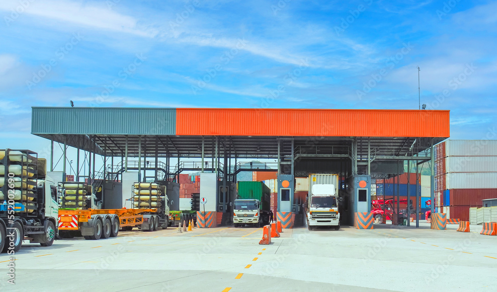 Front view of container depot gate, truck doing gate in gate out and