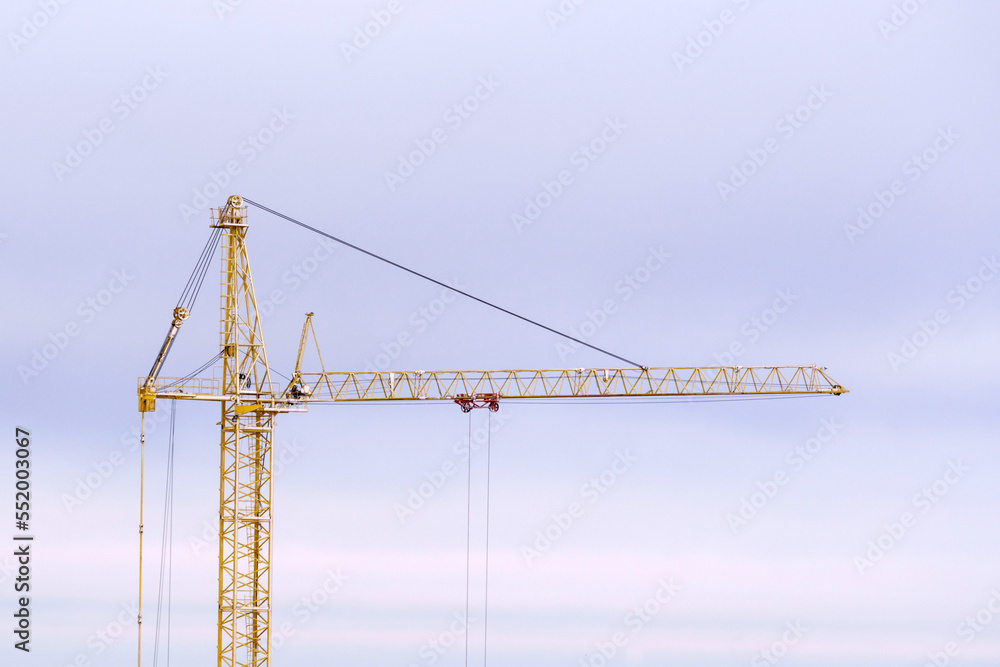 Tower construction crane construction crane. Close up. Copy space. Concept of construction, industry, business