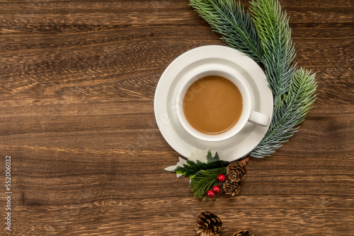 Christmas decorations and coffee on  wooden background. christmas concept.