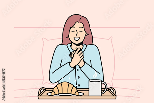 Girl is going to eat croissant, coffee in bed in morning. Delicious breakfast on tray in front of young woman. Tasty pastry, dessert, tea for hungry lady. Vector linear colored isolated illustration.