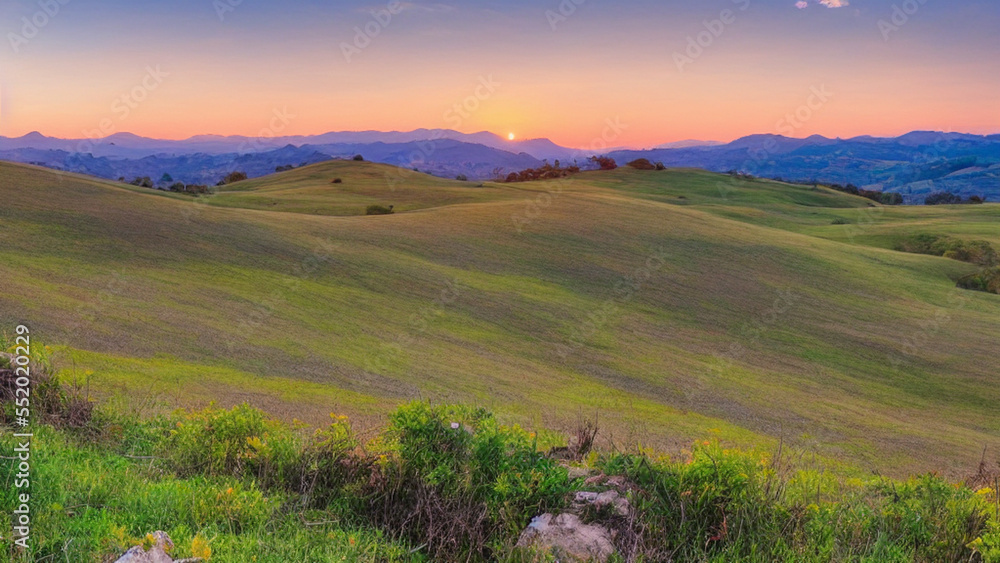 Obraz premium A beautiful landscape, with rolling hills and a picturesque sunset in the background
