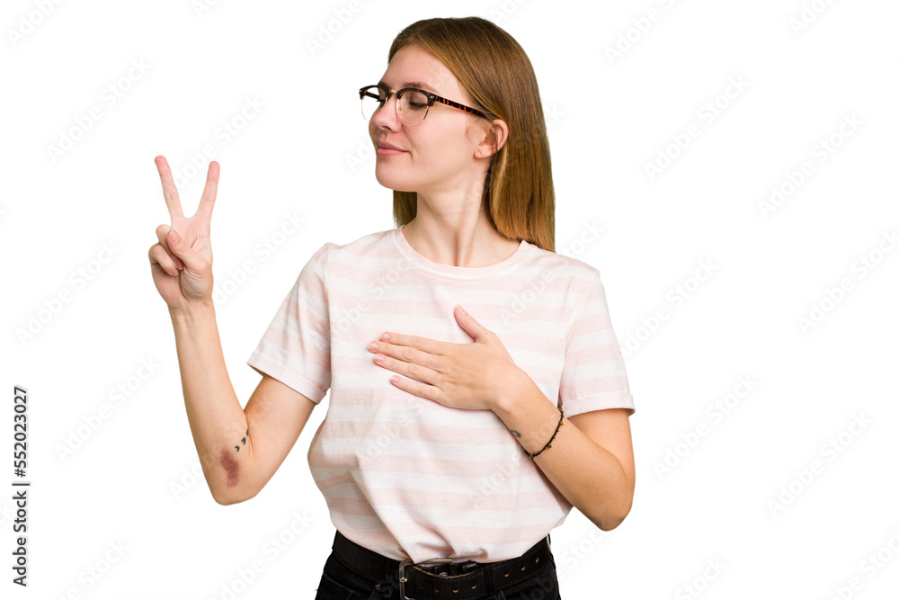 Young caucasian woman isolated taking an oath, putting hand on chest. Young caucasian woman isolated taking an oath, putting hand on chest.