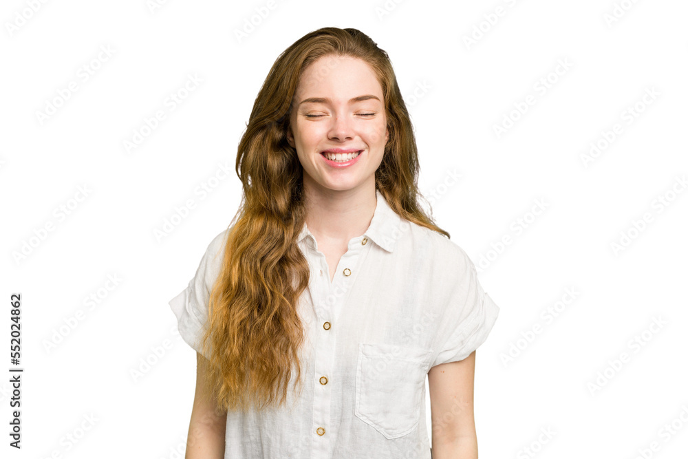 Young caucasian redhead woman isolated laughs and closes eyes, feels relaxed and happy. Young caucasian redhead woman isolated laughs and closes eyes, feels relaxed and happy.