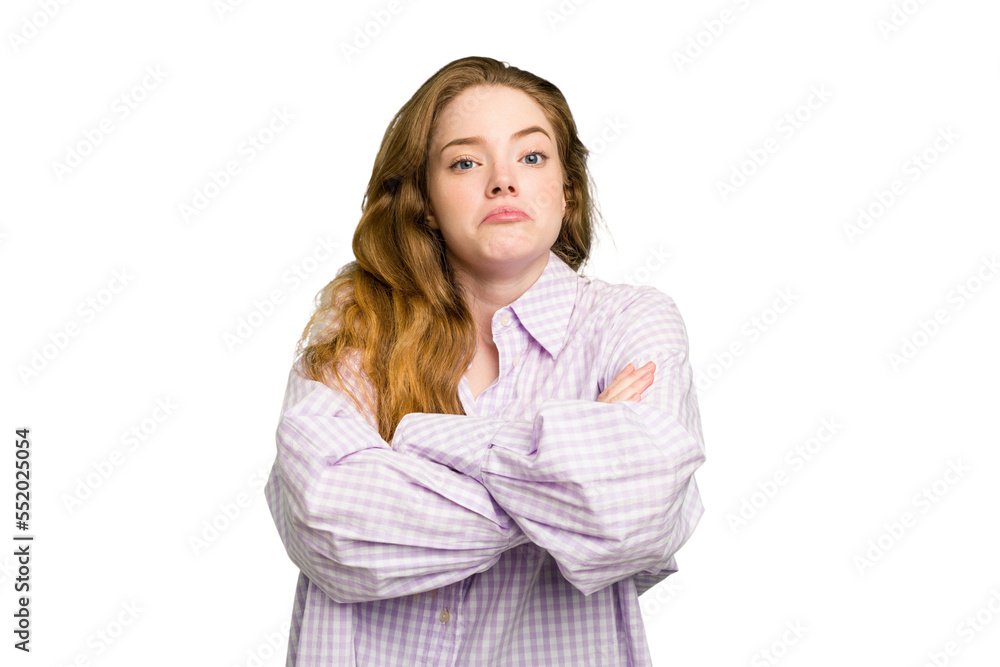 Young caucasian redhead woman isolated shrugs shoulders and open eyes confused. Young caucasian redhead woman isolated shrugs shoulders and open eyes confused.