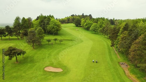 Aerial Drone Flyover Shot of Hole on Glenrothes Golf Course in Fife, Scotland photo