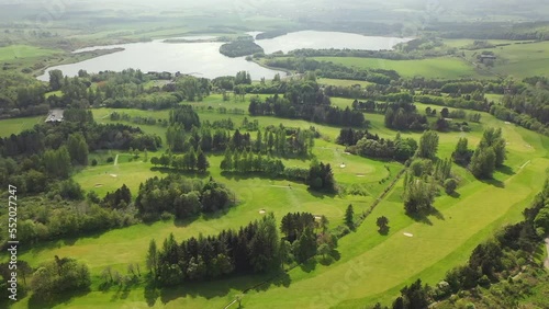 Aerial Drone Fly Over Pan Around Golf Course in Fife, Scotland photo