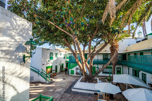 Picturesque white and green settlement called Pueblo Marinero designed by Cesar Manrique located in Costa Teguise, Lanzarote, Canary Island photo