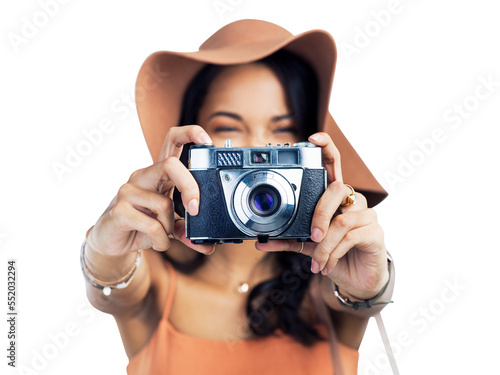 PNG studio shot of a beautiful young woman holding a camera while standing.
