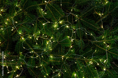 Christmas tree and Xmas lights decoration close up