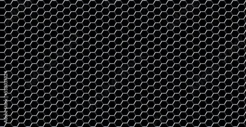 Black perforated metal background. Metal texture steel, carbon fiber background. Perforated sheet metal.
