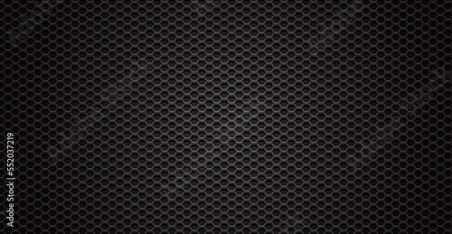 Black perforated metal background. Metal texture steel, carbon fiber background. Perforated sheet metal.