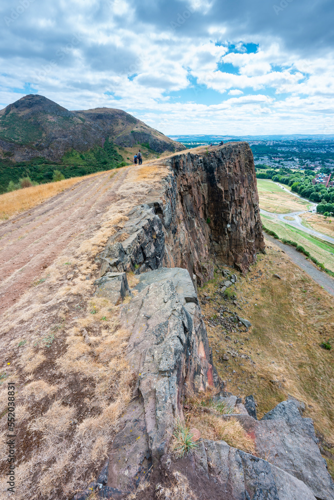 Narrow path between high cliffs,en route to Arthur's Seat,Edinburgh,Scotland,UK.
