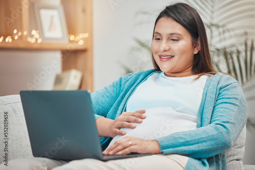 Pregnant, relax or woman online shopping on laptop for baby clothes or shoes on ecommerce website at home. Surfing, pregnancy or happy person in maternity smiles at internet search choices on sofa