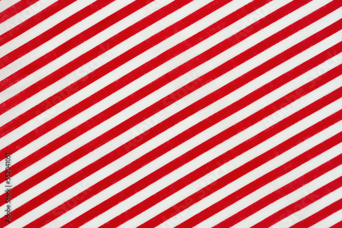 Red and white diagonal stripes material holiday background