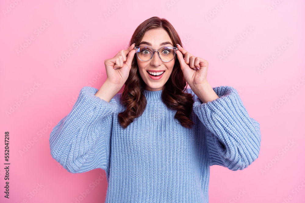 Naklejka premium Portrait of excited good mood curly hair woman wear new eyeglasses good vision nice spectacles surprised cheap price isolated on pink color background