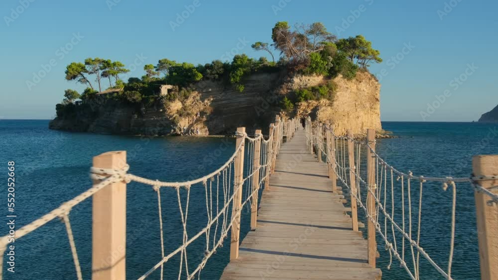 Wooden footbridge leading to the small Cameo island, Zakynthos, Greece. Wooden footbridge leading to the small Cameo island, Zakynthos, Greece.