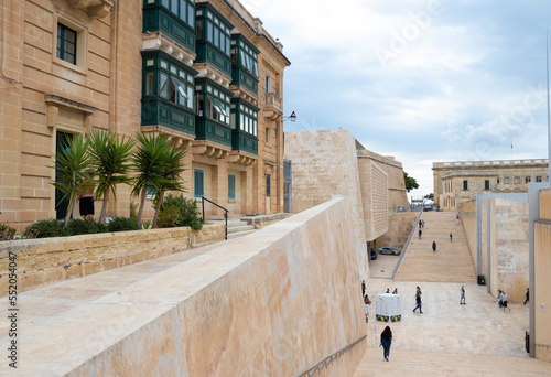 Renzo Piano project - brings in harmony historic maltese house and modern Parliament building with city gate stairs and walls with the use of maltesian stone