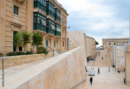 Renzo Piano project - brings in harmony historic maltese house and modern Parliament building with city gate stairs and walls with the use of maltesian stone photo
