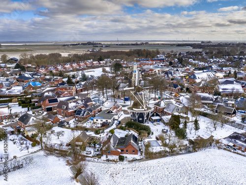 Aerial View over Village of Spijk in Winter