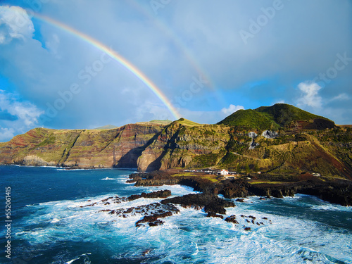 Coastal view and Atlantic Ocean with rainbow, Ponta da Ferraria, Sao Miguel island, Azores, Portugal