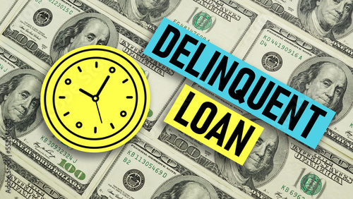 Delinquent loan is shown using the text and photo of dollars photo