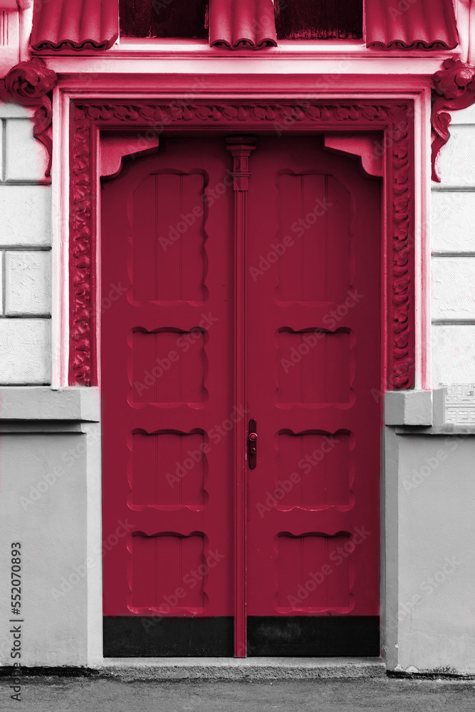 closeup of old color door. New 2023 trending PANTONE 18-1750 Viva Magenta colour