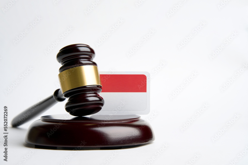 Legal law concept image, judge gavel and flag of Indonesia Legal law concept image, judge gavel and flag of Indonesia
