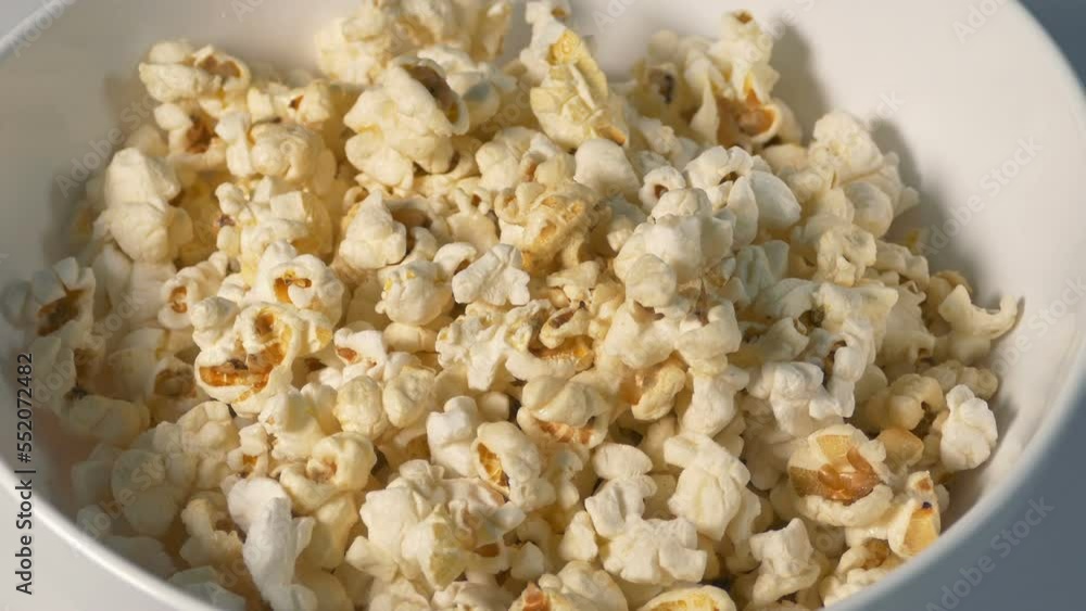 Popcorn Pours Into Bowl Rotating Popcorn Pours Into Bowl Rotating