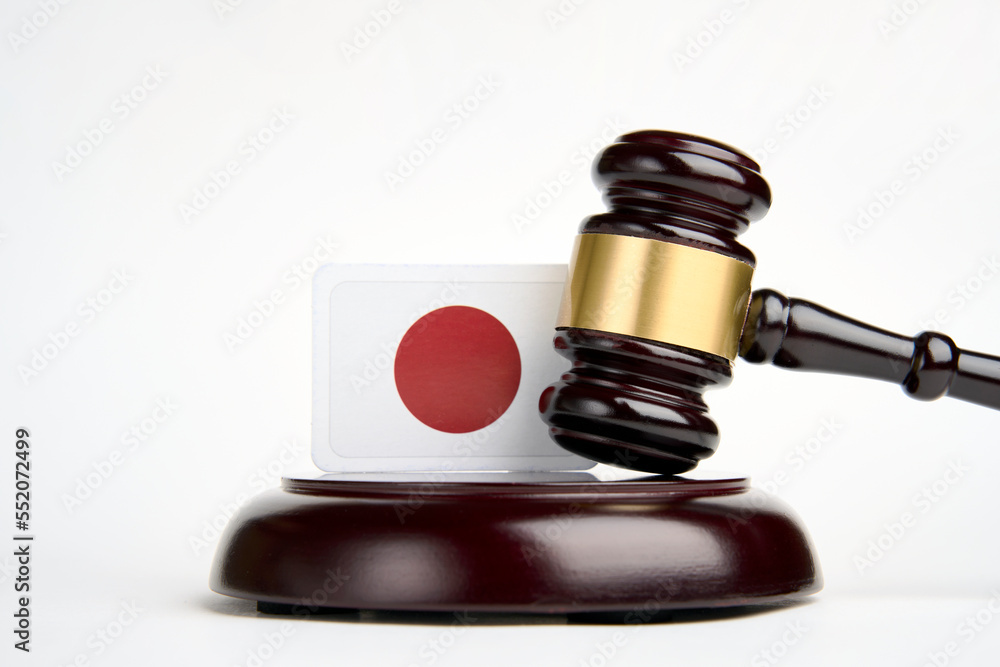 Legal law concept image, judge gavel and flag of Japan Legal law concept image, judge gavel and flag of Japan