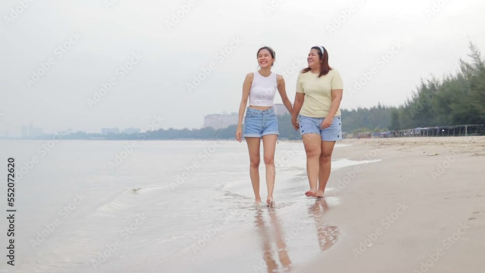 Two Asian women walking at the beach Breathe fresh air. Holiday travel. tourist. LGBT concepts,
lesbian Two Asian women walking at the beach Breathe fresh air. Holiday travel. tourist. LGBT concepts,
lesbian