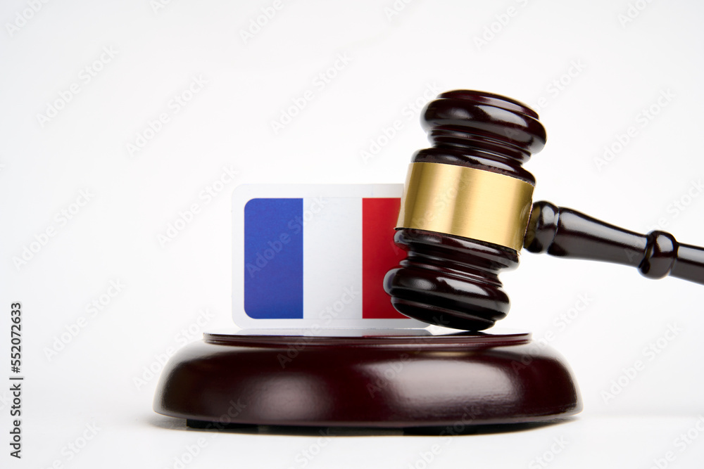 Legal law concept image, judge gavel and flag of France Legal law concept image, judge gavel and flag of France